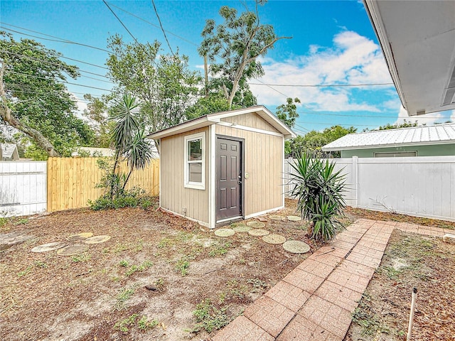 1737 Prince Philip St, Clearwater, FL 33755 - view of shed featuring a fenced backyard