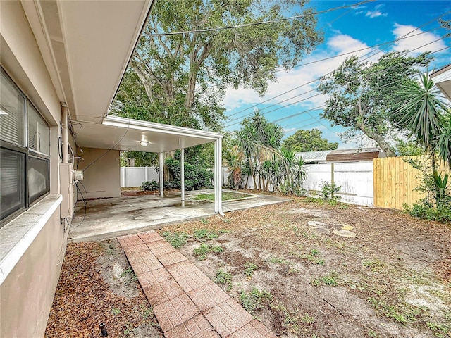 1737 Prince Philip St, Clearwater, FL 33755 - fenced backyard featuring a patio