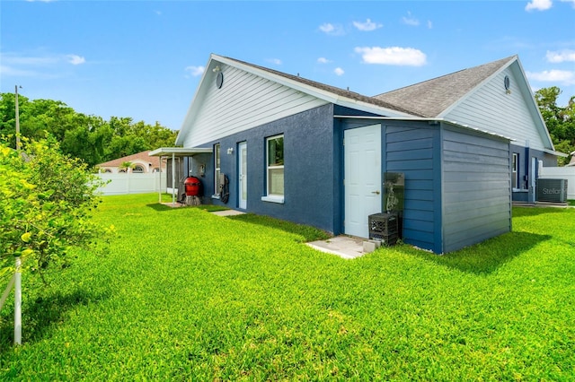 28390 Openfield Loop, Wesley Chapel, FL 33543 - back of house featuring central AC