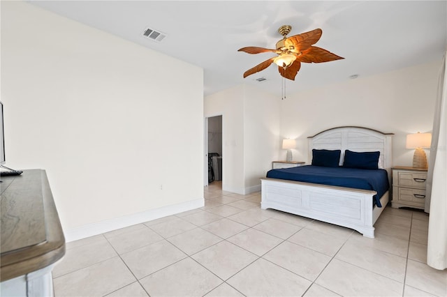 17817 Gulf Blvd Unit A, Saint Petersburg, FL 33708 - bedroom with light tile patterned flooring, baseboards, and a ceiling fan