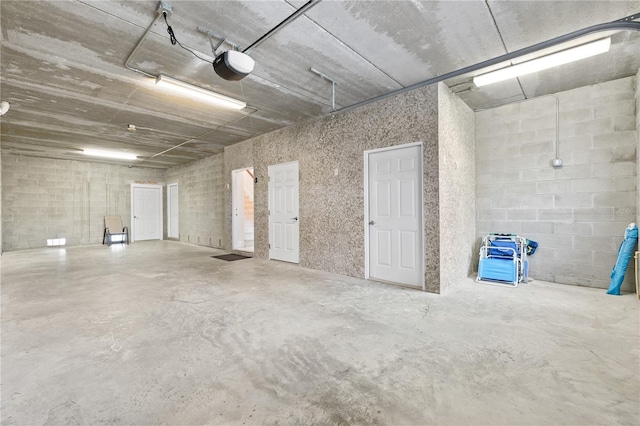 17817 Gulf Blvd Unit A, Saint Petersburg, FL 33708 - garage with a garage door opener and concrete block wall