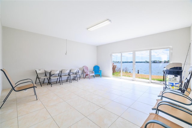 17817 Gulf Blvd Unit A, Saint Petersburg, FL 33708 - living area with a water view and tile patterned floors
