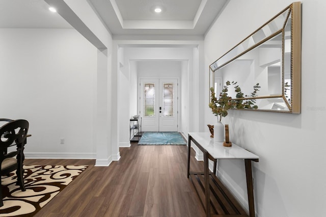 3559 Maple Bay Ln, Land O Lakes, FL 34638 - entrance foyer featuring dark wood-style flooring, a tray ceiling, and recessed lighting