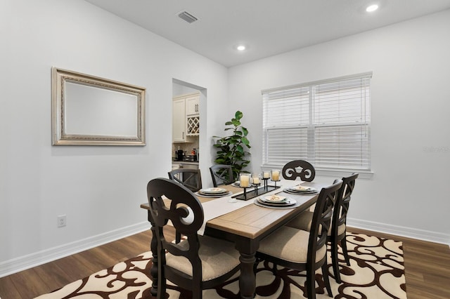 3559 Maple Bay Ln, Land O Lakes, FL 34638 - dining area with dark wood-style flooring and recessed lighting
