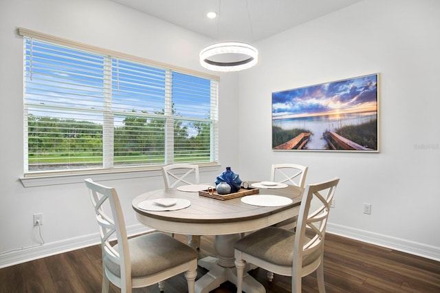 3559 Maple Bay Ln, Land O Lakes, FL 34638 - dining area featuring wood finished floors