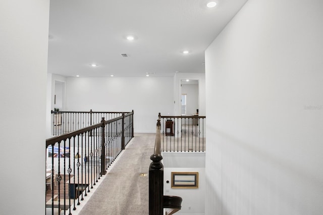 3559 Maple Bay Ln, Land O Lakes, FL 34638 - hallway with recessed lighting, light carpet, and an upstairs landing