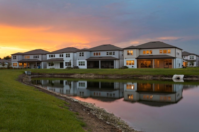 3559 Maple Bay Ln, Land O Lakes, FL 34638 - back of property with a water view and a yard