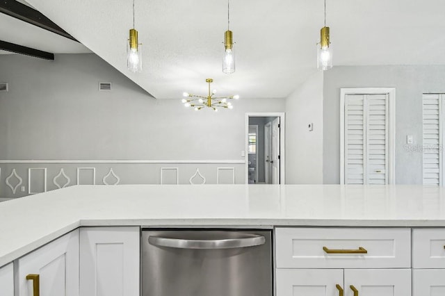 325 Gladstone Blvd, Englewood, FL 34223 - kitchen with stainless steel dishwasher, a chandelier, white cabinetry, and decorative light fixtures