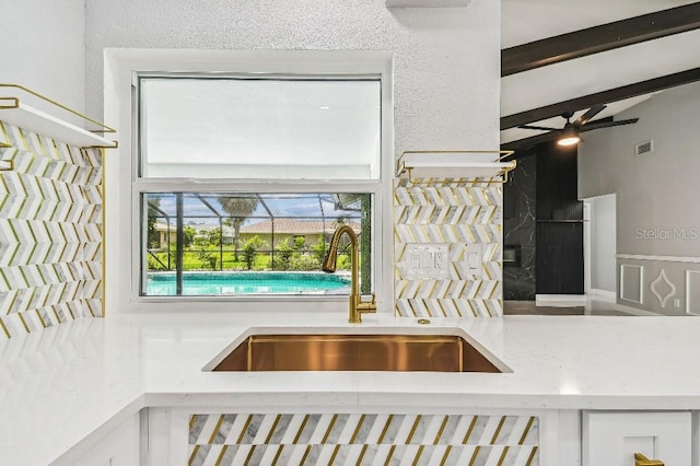 325 Gladstone Blvd, Englewood, FL 34223 - detailed view of a sink and ceiling fan