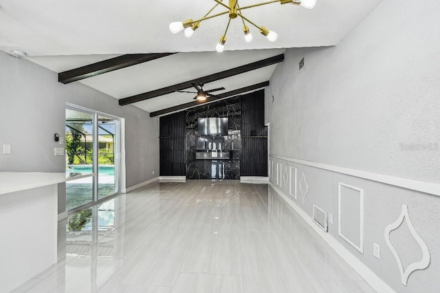 325 Gladstone Blvd, Englewood, FL 34223 - empty room featuring a chandelier and a ceiling fan