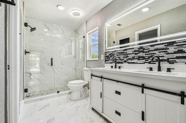 325 Gladstone Blvd, Englewood, FL 34223 - full bath featuring a marble finish shower, double vanity, marble finish flooring, decorative backsplash, and a textured ceiling