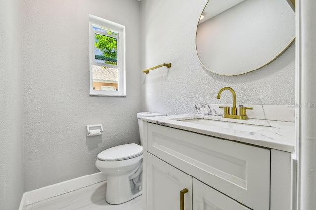 325 Gladstone Blvd, Englewood, FL 34223 - bathroom with vanity and a textured wall