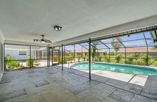 325 Gladstone Blvd, Englewood, FL 34223 - outdoor pool featuring a patio area and glass enclosure