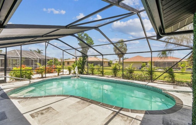 325 Gladstone Blvd, Englewood, FL 34223 - outdoor pool with glass enclosure and a patio area