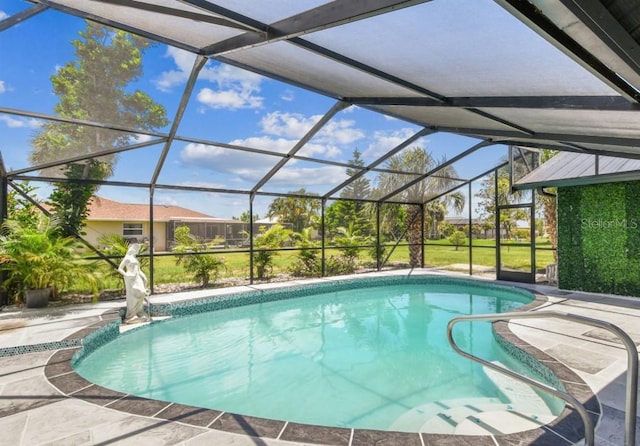 325 Gladstone Blvd, Englewood, FL 34223 - outdoor pool featuring a patio area and glass enclosure