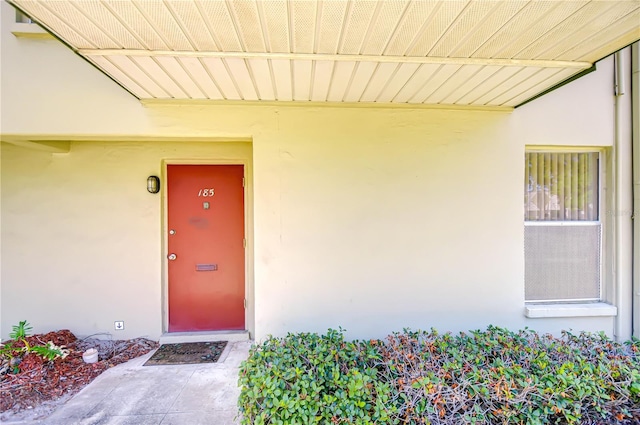 1799 N Highland Ave Unit 185, Clearwater, FL 33755 - view of exterior entry featuring stucco siding