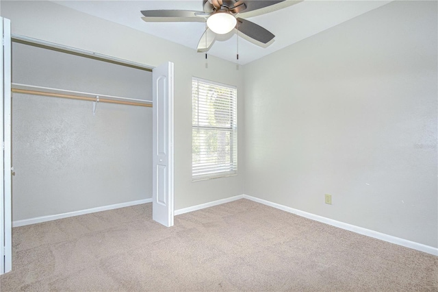 1799 N Highland Ave Unit 185, Clearwater, FL 33755 - unfurnished bedroom with carpet floors, baseboards, a closet, and ceiling fan