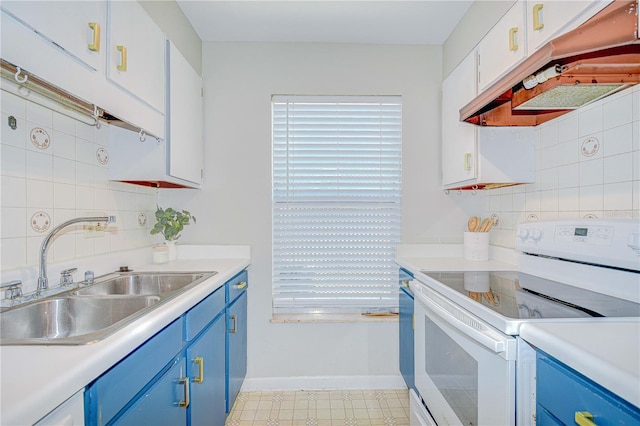 1799 N Highland Ave Unit 185, Clearwater, FL 33755 - kitchen with white range with electric stovetop, blue cabinetry, a sink, decorative backsplash, and exhaust hood