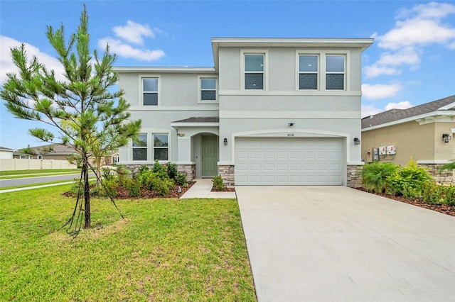 32136 Conchshell Sail St, Wesley Chapel, FL 33545 - view of front of home with stone siding, stucco siding, a garage, and a front lawn