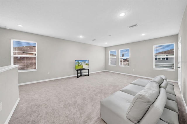 32136 Conchshell Sail St, Wesley Chapel, FL 33545 - carpeted living area with recessed lighting and baseboards