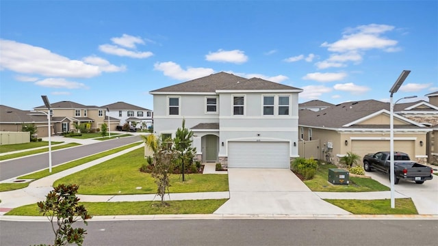 32136 Conchshell Sail St, Wesley Chapel, FL 33545 - view of front of property featuring a residential view, driveway, stucco siding, a front lawn, and stone siding