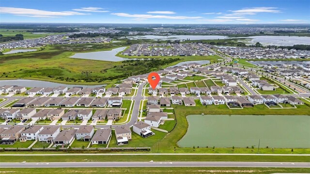 32136 Conchshell Sail St, Wesley Chapel, FL 33545 - aerial overview of property's location with nearby suburban area and a nearby body of water