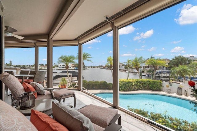 5782 Westshore Dr, New Port Richey, FL 34652 - view of pool with a water view and a ceiling fan
