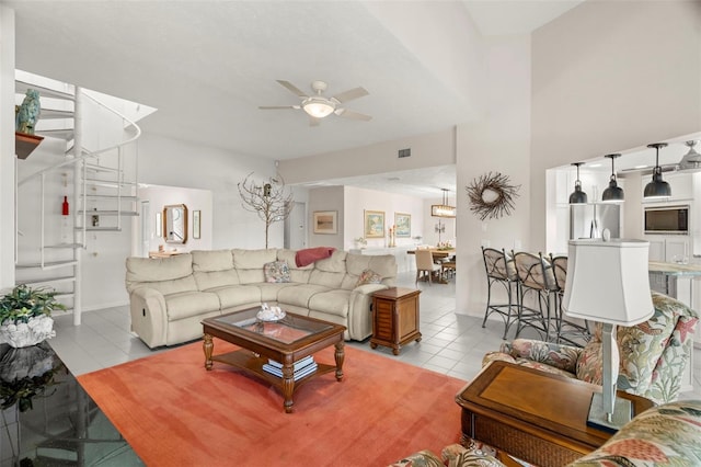 5782 Westshore Dr, New Port Richey, FL 34652 - living room featuring tile patterned flooring and a ceiling fan