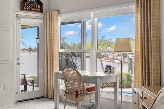 5782 Westshore Dr, New Port Richey, FL 34652 - sunroom / solarium featuring a water view