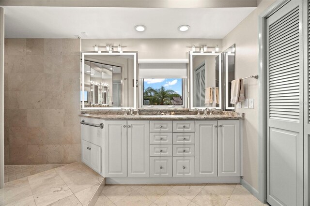 5782 Westshore Dr, New Port Richey, FL 34652 - bathroom with double vanity and recessed lighting