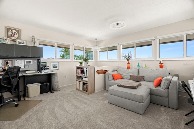 5782 Westshore Dr, New Port Richey, FL 34652 - home office featuring light carpet and baseboards