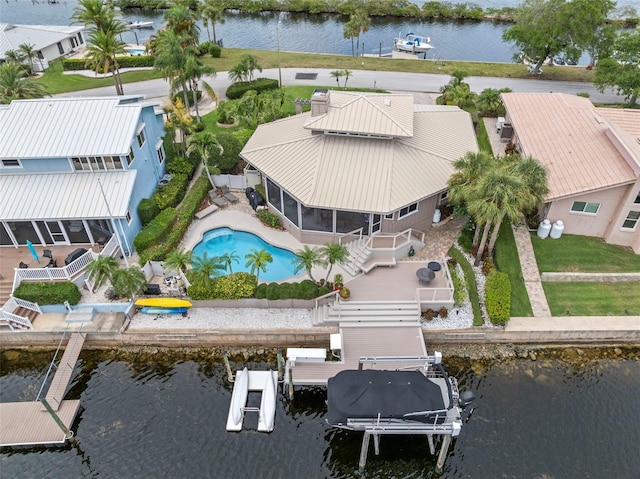 5782 Westshore Dr, New Port Richey, FL 34652 - aerial view of property and surrounding area with a large body of water and a pool
