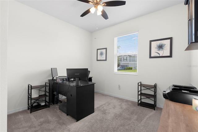 12481 Aston Dr, Hudson, FL 34669 - office area featuring a ceiling fan, carpet flooring, and baseboards