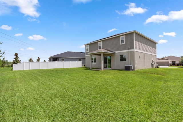 12481 Aston Dr, Hudson, FL 34669 - rear view of property featuring central air condition unit and stucco siding
