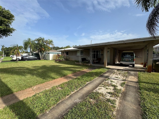 2160 NE 53rd St, Fort Lauderdale, FL 33308 - view of front of home featuring driveway, a front yard, and a carport