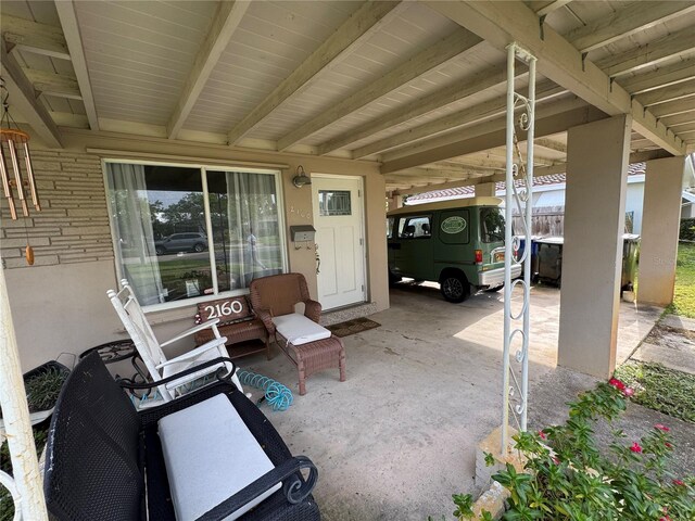 2160 NE 53rd St, Fort Lauderdale, FL 33308 - view of patio with a carport