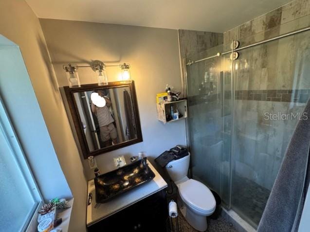 2160 NE 53rd St, Fort Lauderdale, FL 33308 - full bathroom featuring toilet, a shower stall, and vanity