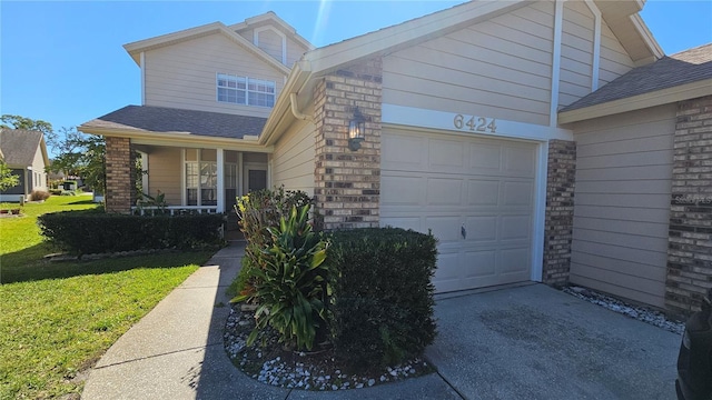 6424 Thicket Trl, New Port Richey, FL 34653 - view of front of house with a front yard, an attached garage, driveway, a porch, and roof with shingles