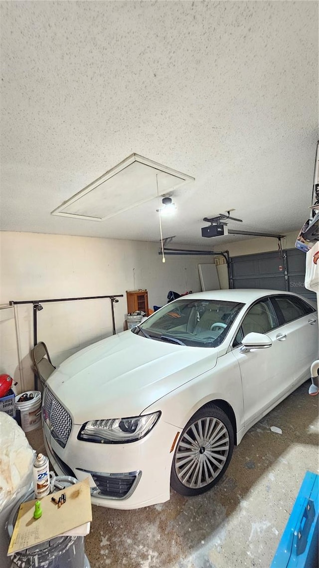 6424 Thicket Trl, New Port Richey, FL 34653 - garage featuring a garage door opener