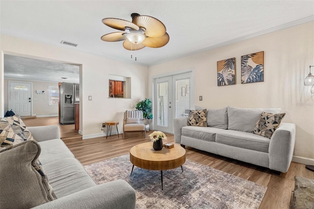10339 111th St, Largo, FL 33778 - living area featuring light wood-type flooring and a ceiling fan