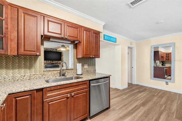 10339 111th St, Largo, FL 33778 - kitchen with dishwasher, backsplash, light wood-style flooring, glass insert cabinets, and ornamental molding