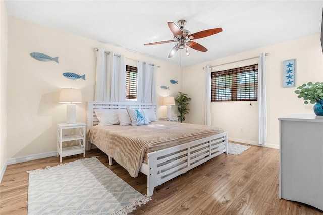 10339 111th St, Largo, FL 33778 - bedroom featuring wood finished floors and a ceiling fan