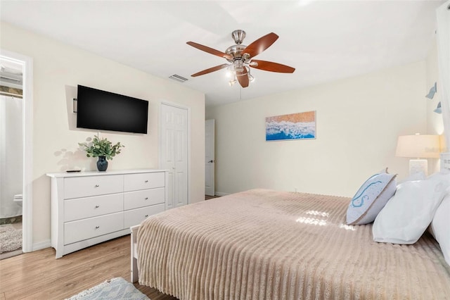10339 111th St, Largo, FL 33778 - bedroom featuring light wood-style floors and a ceiling fan