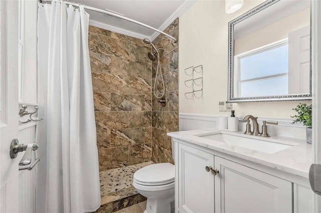 10339 111th St, Largo, FL 33778 - full bathroom featuring crown molding, vanity, tiled shower, and a wainscoted wall