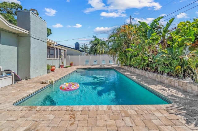10339 111th St, Largo, FL 33778 - view of pool featuring a fenced backyard and a patio area
