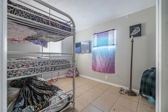 1771 Russell St S, Saint Petersburg, FL 33712 - bedroom with tile patterned flooring and baseboards