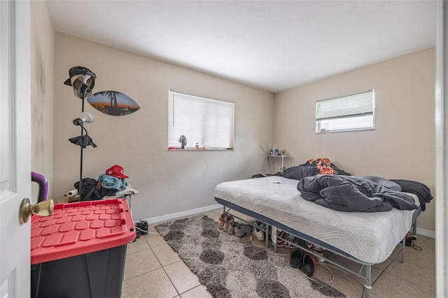 1771 Russell St S, Saint Petersburg, FL 33712 - bedroom featuring tile patterned flooring and baseboards