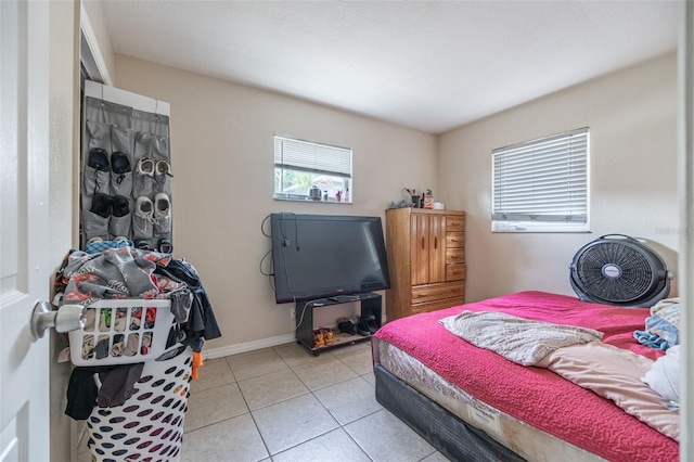1771 Russell St S, Saint Petersburg, FL 33712 - bedroom with light tile patterned floors