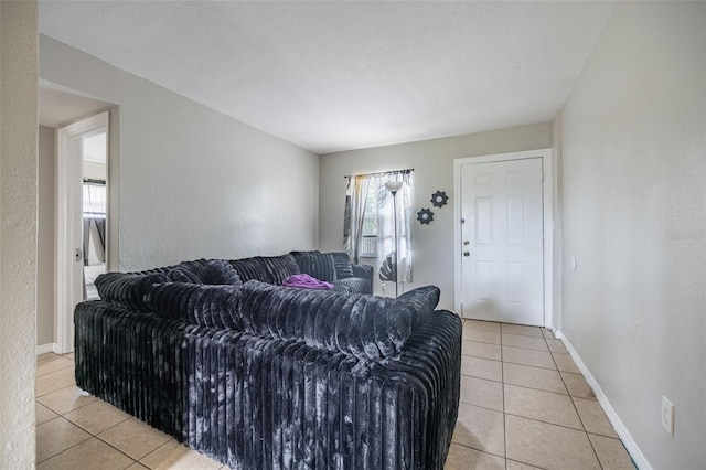 1771 Russell St S, Saint Petersburg, FL 33712 - living area featuring light tile patterned flooring and a textured wall