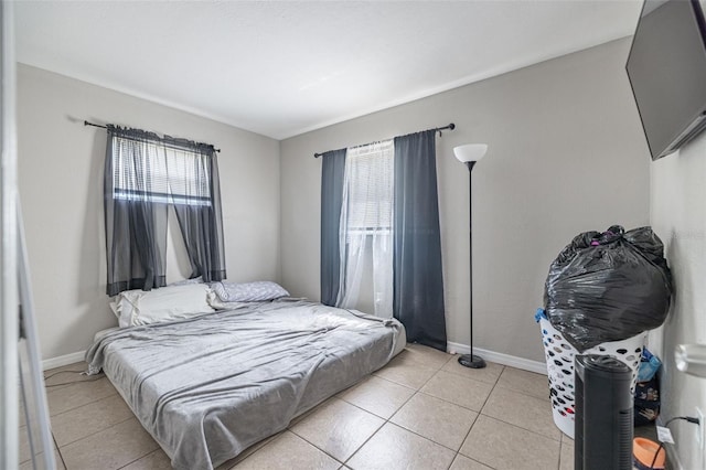 1771 Russell St S, Saint Petersburg, FL 33712 - bedroom featuring light tile patterned floors and baseboards